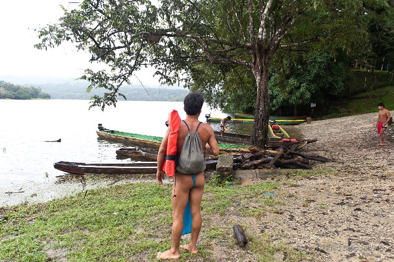20101203_105839 D3.jpg - There are 4 or 5 communities along the Chagres River.   Here one of the group awaits my arrival and has a life preserver for me.